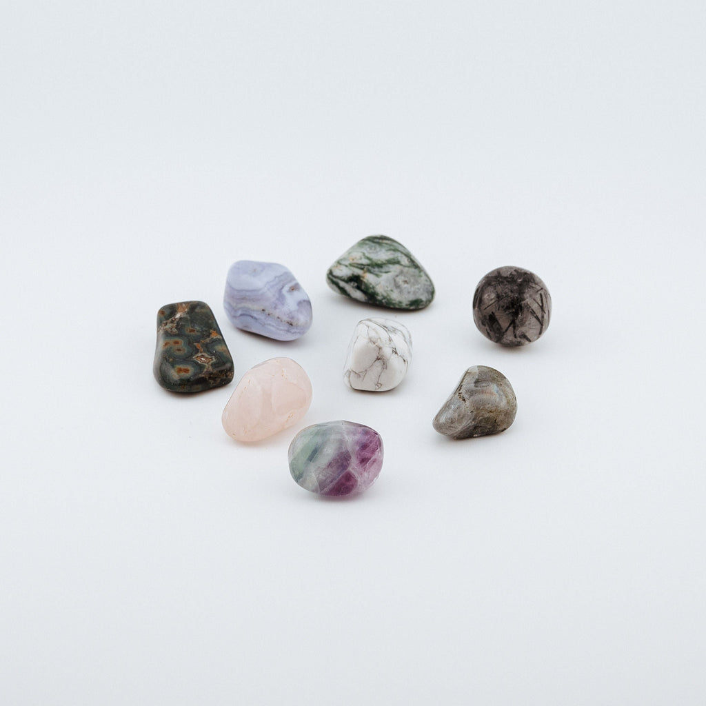 Collection of various textured stones on a white background