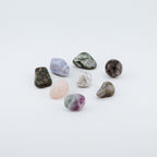 Collection of various textured stones on a white background