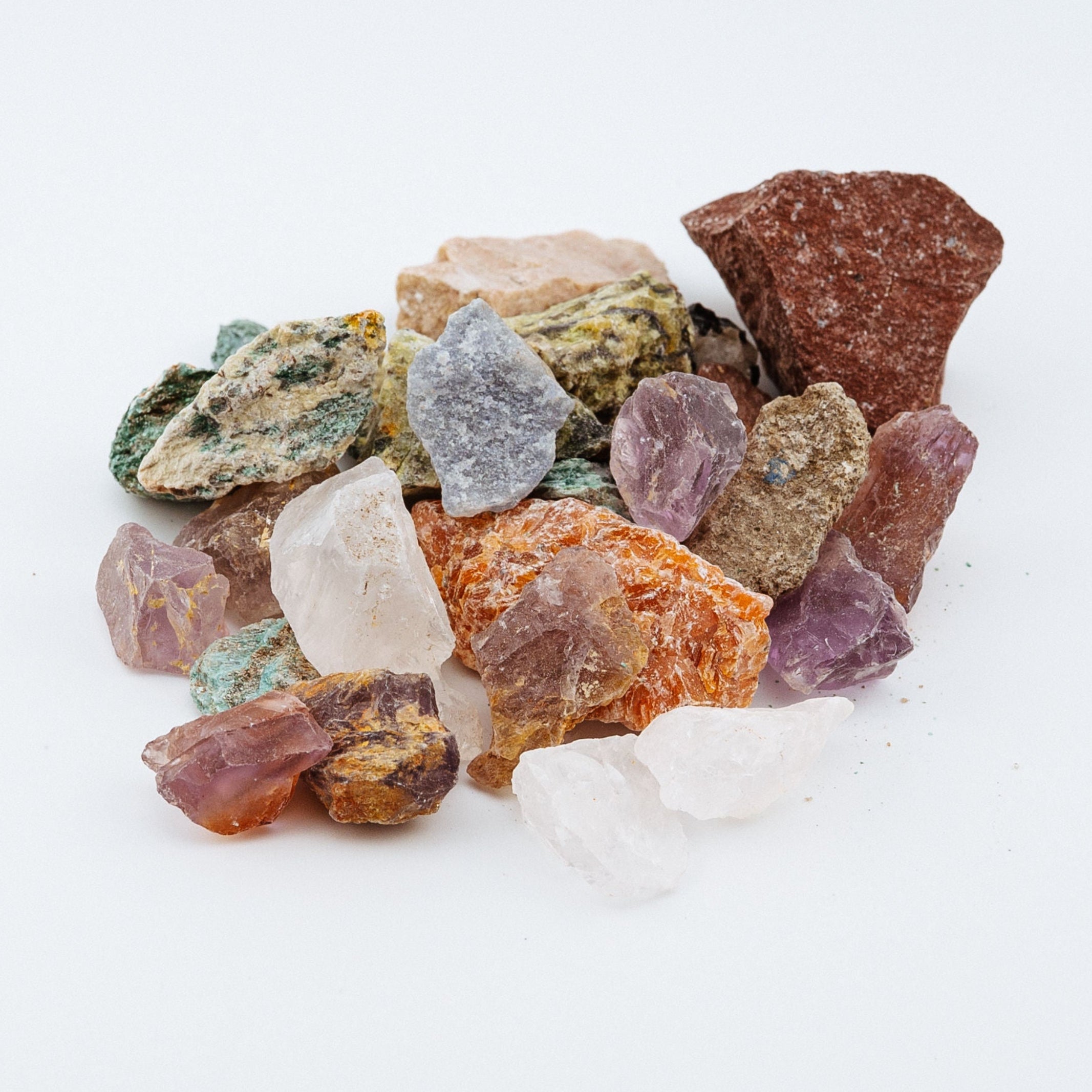 Assorted colorful crystals on a white background
