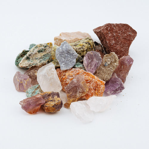 Assorted colorful crystals on a white background