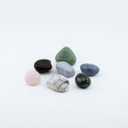 Collection of multicolored crystals on a white background