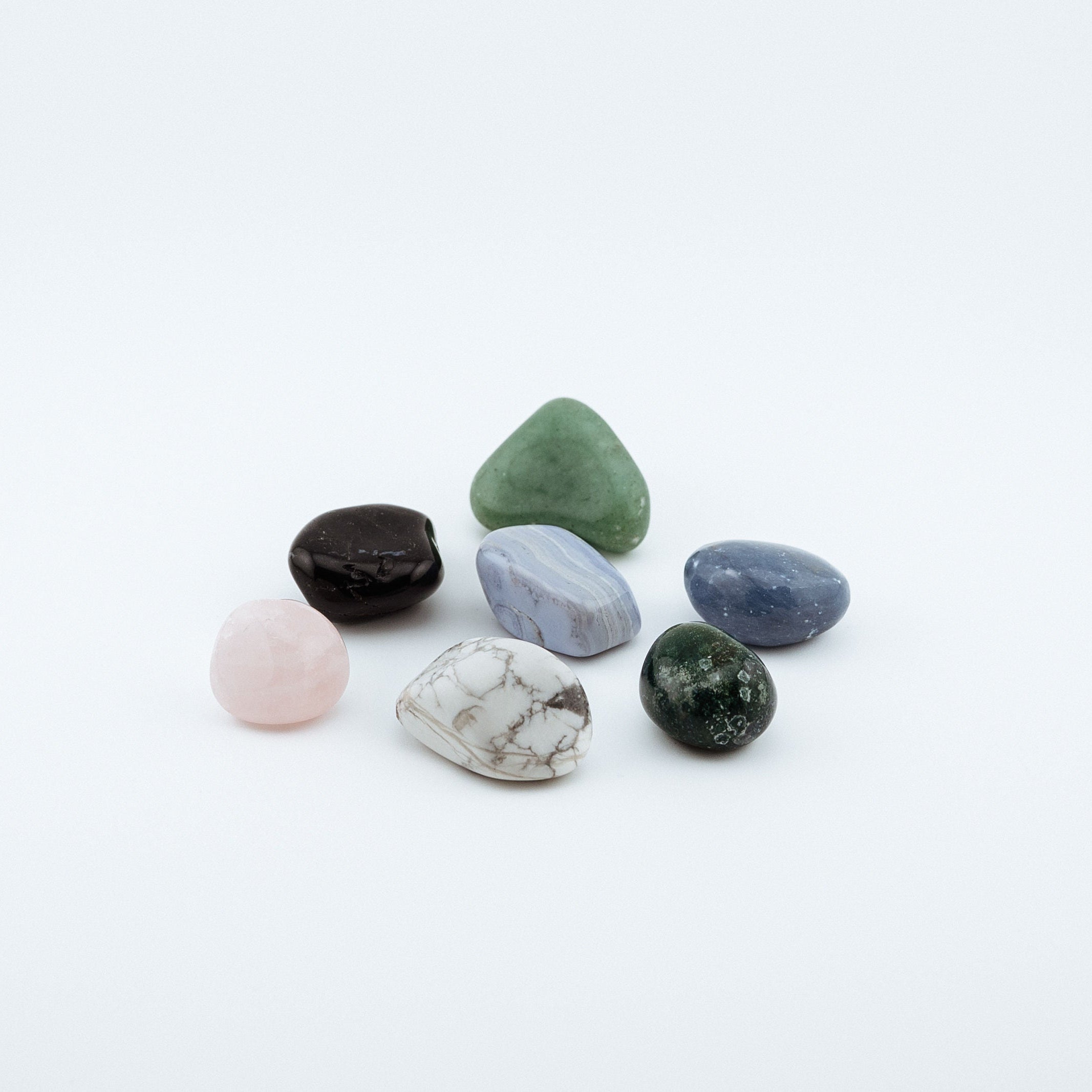 Collection of multicolored crystals on a white background