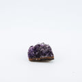 Purple crystal on a white background