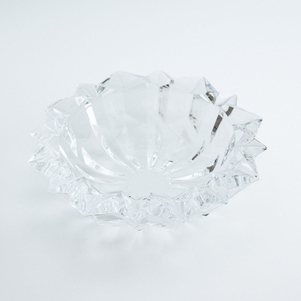 Clear glass bowl on a white background