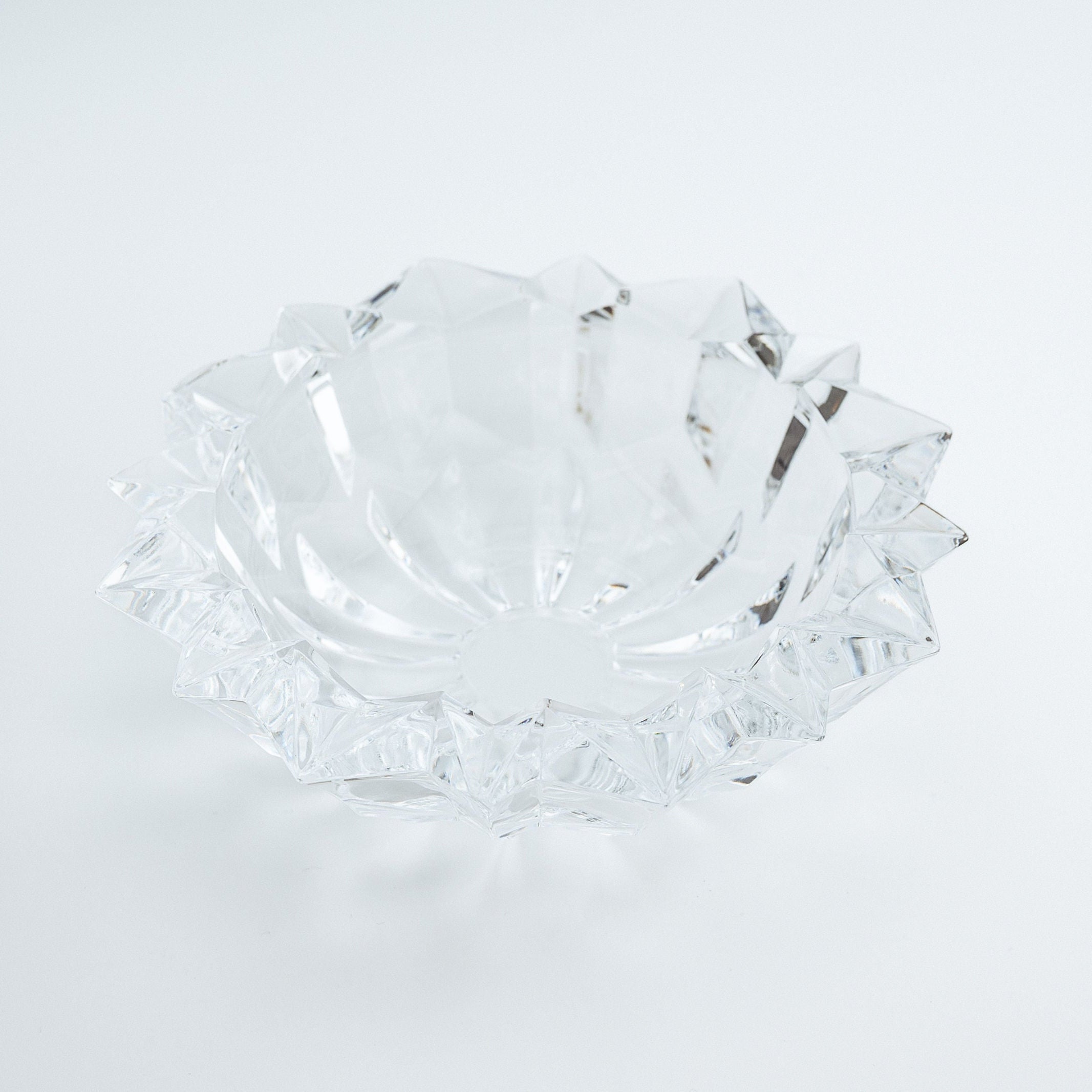 Clear glass bowl on a white background