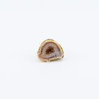 Geode cut in half on a white background