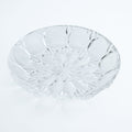 Clear glass bowl on a white background