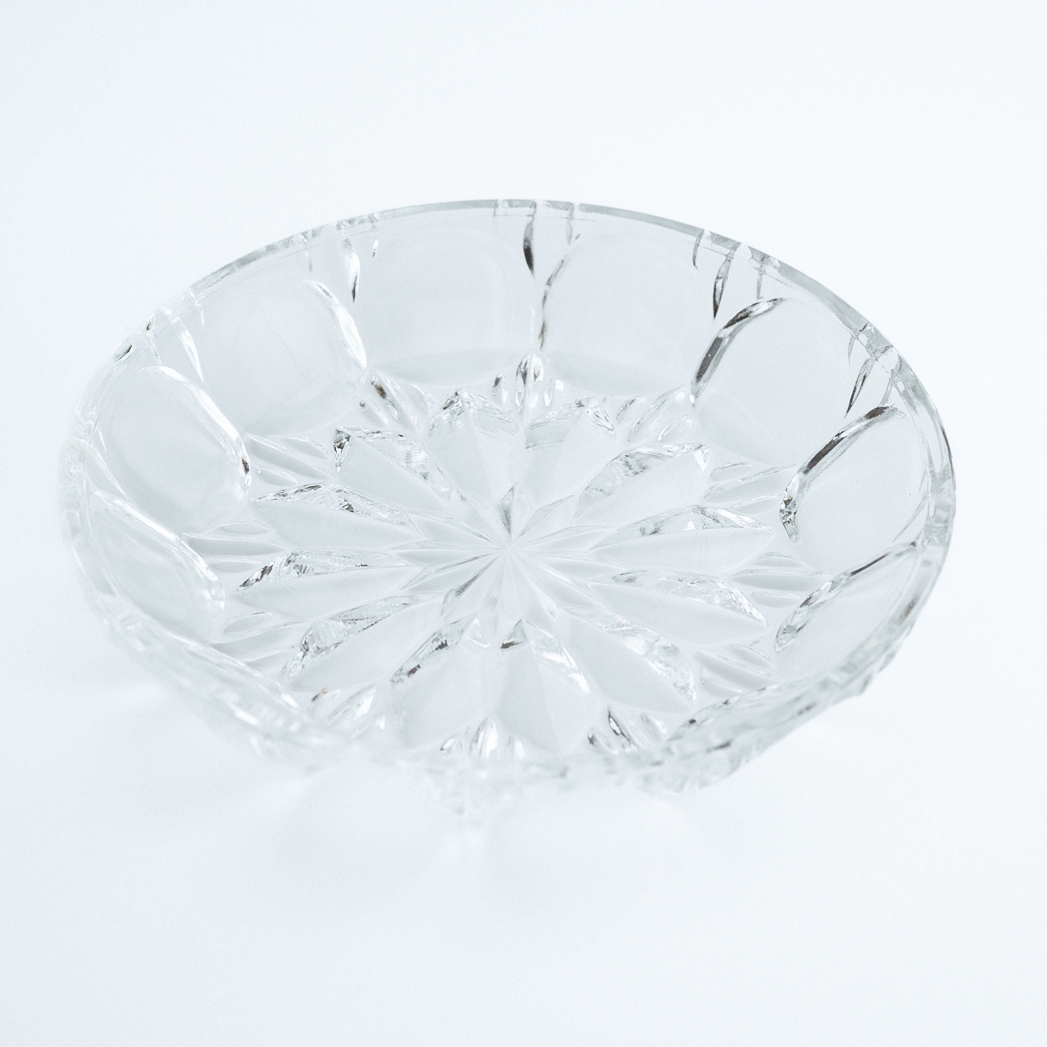 Clear glass bowl on a white background