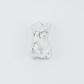 Small white carving on a light gray background