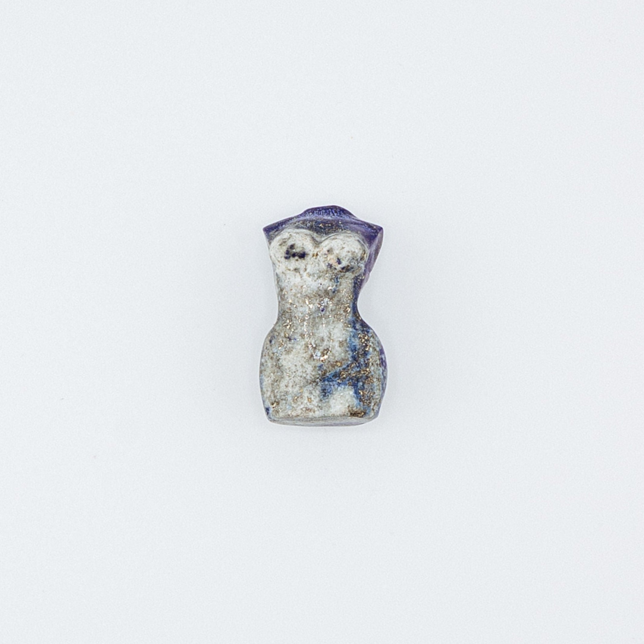 Small stone sculpture on a white background