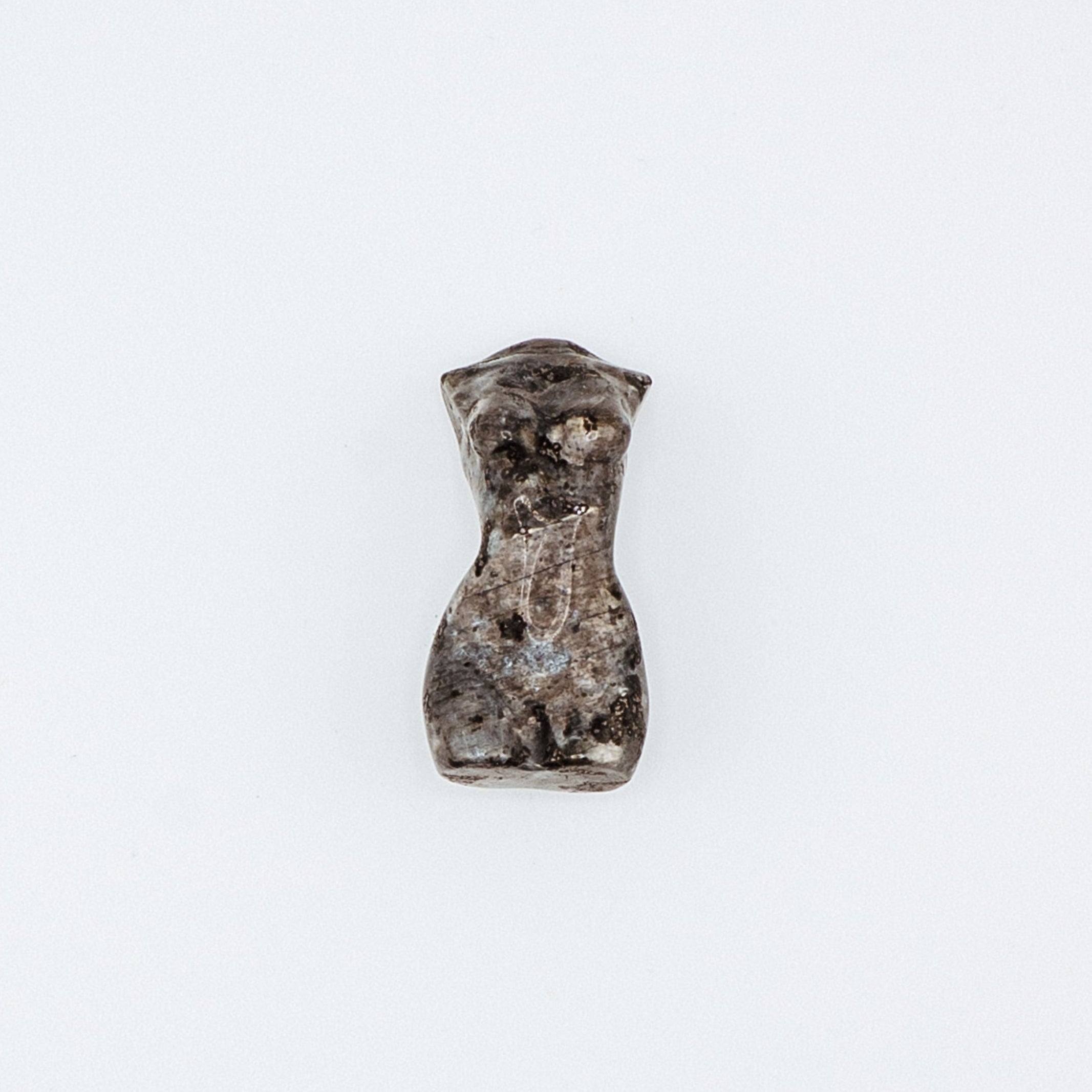 Small stone carving on a white background