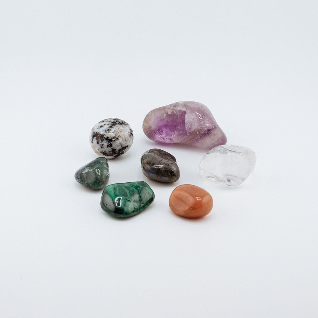 Assorted colorful crystals on a white background