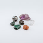 Assorted colorful crystals on a white background